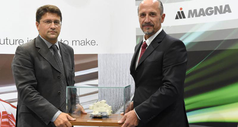 Riccardo Berti (left), Director of Product Management & Business Development at Magna Closures Europe, and Franco Ottino, Director of Engineering at Magna Closures Europe, at the 50 million latches celebration held at Magna's Guasticce, Italy, manufacturing facility. (PRNewsFoto/Magna International Inc.)