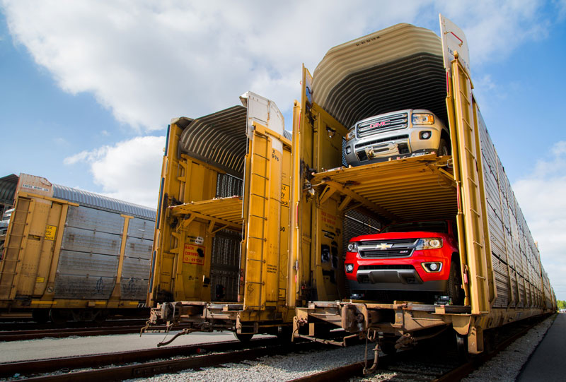 The 2015 Chevrolet Colorado and 2015 GMC Canyon midsize trucks load onto carriers to begin shipping to dealers Thursday, September 18, 2014 from the General Motors Wentzville Assembly plant where they are made in Wentzville, Missouri. Consumers have created more than 100,000 configurations of the trucks since the Colorado Build Your Own and Canyon Build Your Own websites went live on September 3. (Photo by Melissa Vaeth for General Motors)