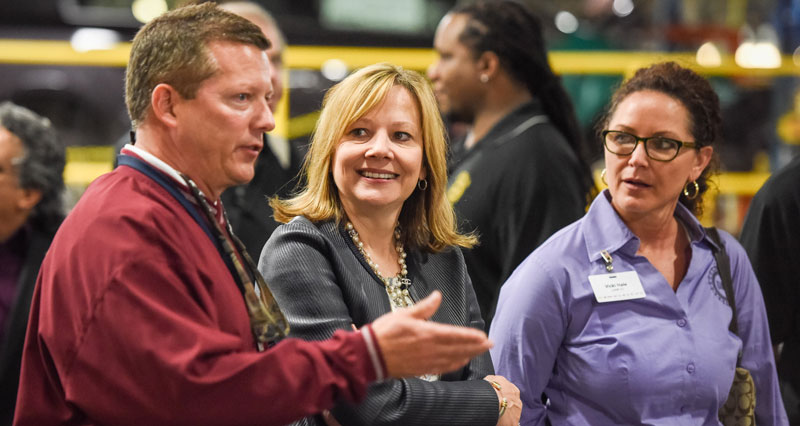 General Motors CEO Mary Barra (center) tours the GM Fairfax Assembly plant